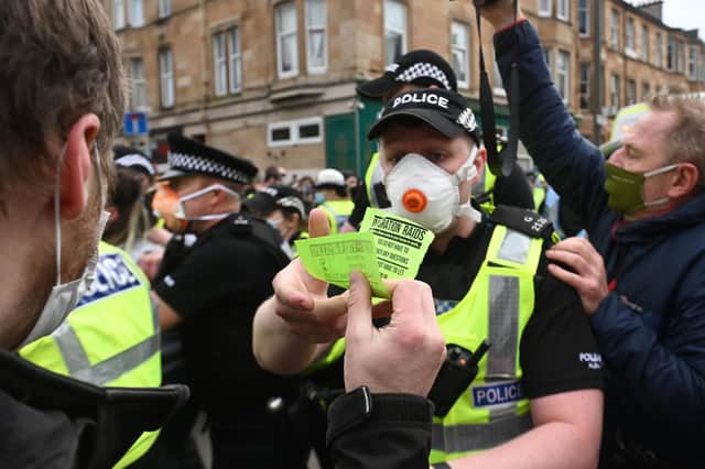 Officers say they were called to support immigration officials after they were blocked in.