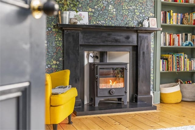 Feature fireplace in lounge.