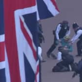 TV viewers saw the arrests.