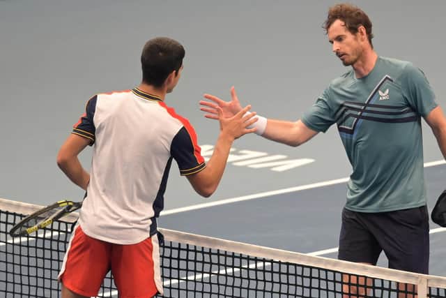 Andy Murray congratulates Carlos Alcaraz on his victory at the Vienna Open (Photo by JOE KLAMAR/AFP via Getty Images)