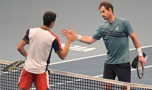 Andy Murray congratulates Carlos Alcaraz on his victory at the Vienna Open (Photo by JOE KLAMAR/AFP via Getty Images)