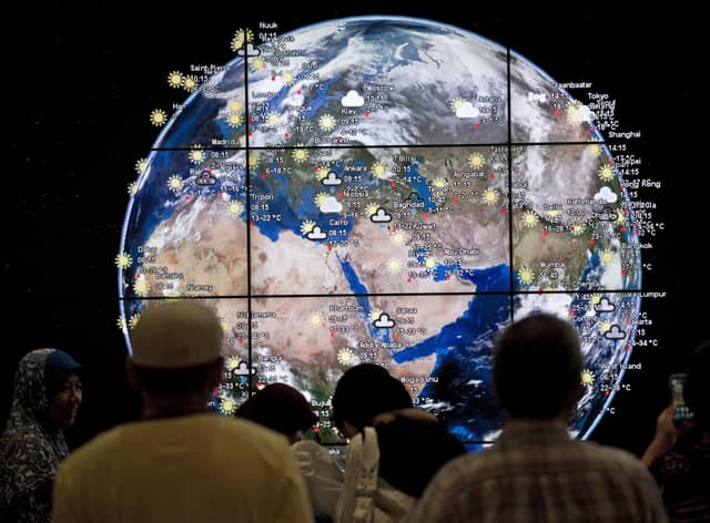 The creation of a fully realised 'digital Earth' could do much more than just tell people the weather, like this one at Kuala Lumpur International Airport (Picture: Mohd Rasfan/AFP via Getty Images)