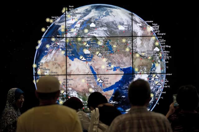 The creation of a fully realised 'digital Earth' could do much more than just tell people the weather, like this one at Kuala Lumpur International Airport (Picture: Mohd Rasfan/AFP via Getty Images)