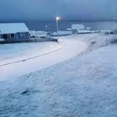 Snowfall in the Shetland Islands has caused problems, with frozen slush weighing down power lines.