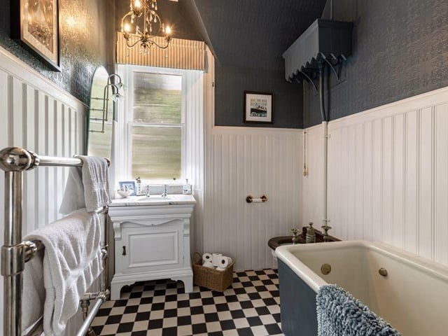 Bathroom with restored Victorian features.