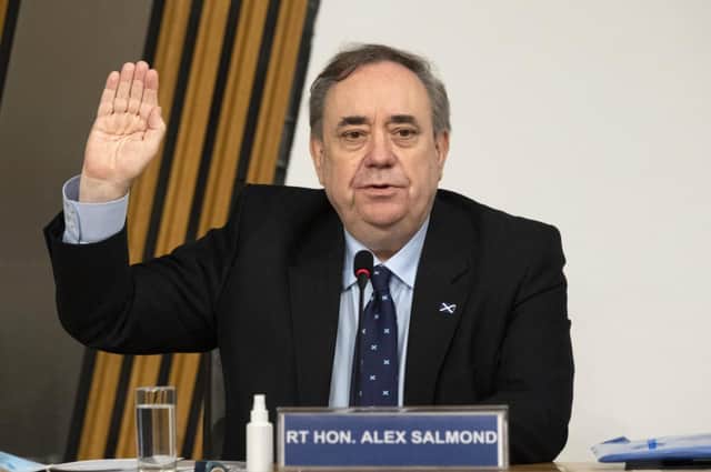 Former Minister Alex Salmond takes the oath before giving his evidence to the MSPs' committee investigating the Scottish government's mishandling of allegations made against him (Picture: Getty Images)