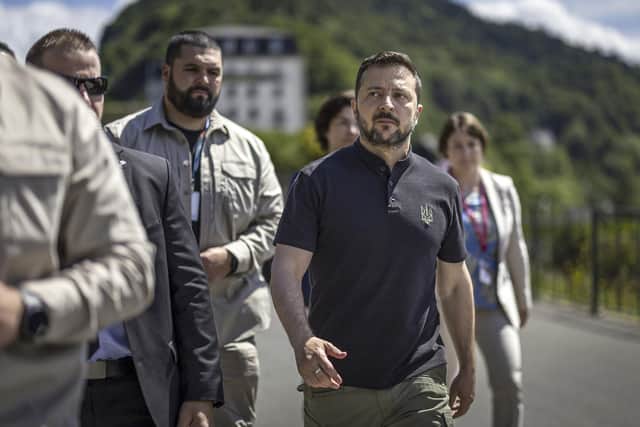 Ukrainian president Volodymyr Zelenskyy walks to attend a plenary session, during the summit on peace in Ukraine, in Obbürgen, Switzerland. Picture: Michael Buholzer/Keystone via AP