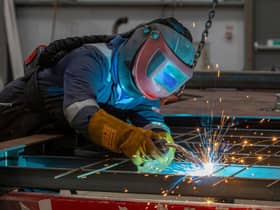 Small firms are facing a raft of financial pressures that will be compounded by tax increases next month. Picture: AFP via Getty Images.