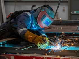 Small firms are facing a raft of financial pressures that will be compounded by tax increases next month. Picture: AFP via Getty Images.