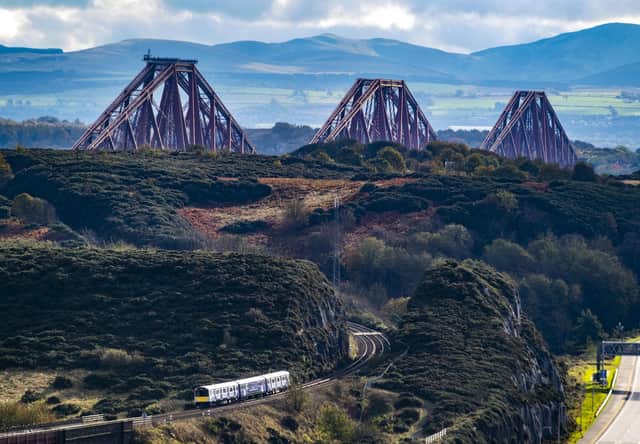 A Vivarail battery train near the Forth Bridge which was demonstrated during the COP26 climate change summit in Glasgow last November (Picture: Network Rail)