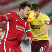 Liverpool's Swiss midfielder Xherdan Shaqiri (L) heads the ball against Burnley's English midfielder Josh Brownhill (R) during the English Premier League football match between Liverpool and Burnley at Anfield in Liverpool, north west England on January 21, 2021. (Photo by Jon Super / POOL / AFP)