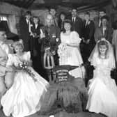 Seven couples getting married at the Gretna Green Smithy's Anvil on Valentine's Day 1989.
