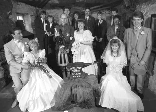 Seven couples getting married at the Gretna Green Smithy's Anvil on Valentine's Day 1989.