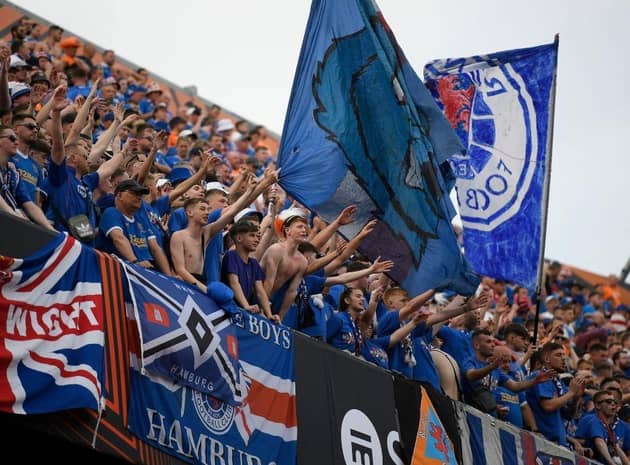 Rangers supporters cheer from the stands prior to the UEFA Europa League final football match between Eintracht Frankfurt and Glasgow Rangers at the Ramon Sanchez Pizjuan stadium in Seville on May 18, 2022. (Photo by JORGE GUERRERO / AFP) (Photo by JORGE GUERRERO/AFP via Getty Images)