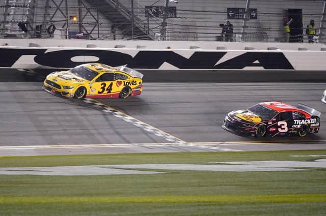 Michael McDowell crosses the finish line ahead of Austin Dillon to win the NASCAR Daytona 500. Picture: John Raoux/AP