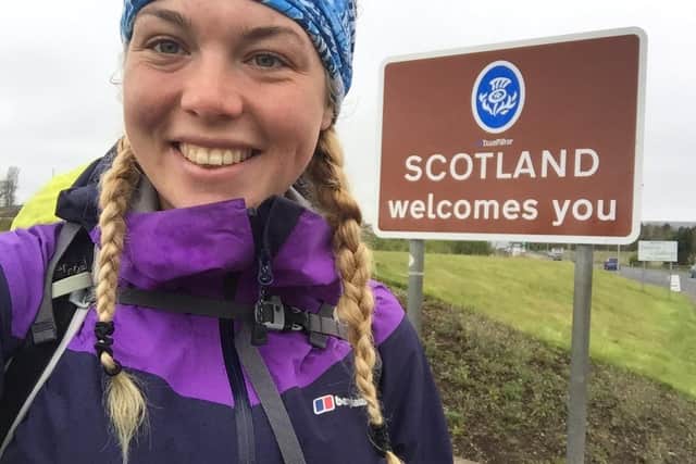 Elise Downing crosses the Border into Scotland on her run around the coastline of the UK.