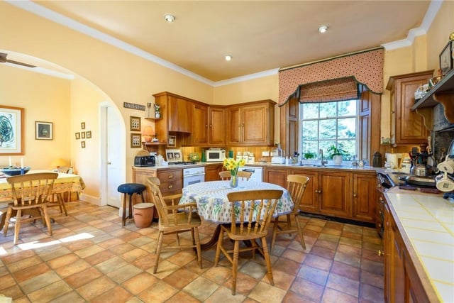 The kitchen overlooks the garden and has fitted appliances including a two door AGA. It also has a spacious area for breakfasting or informal dining.