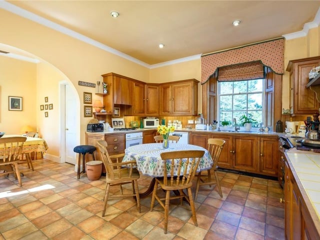 The kitchen overlooks the garden and has fitted appliances including a two door AGA. It also has a spacious area for breakfasting or informal dining.