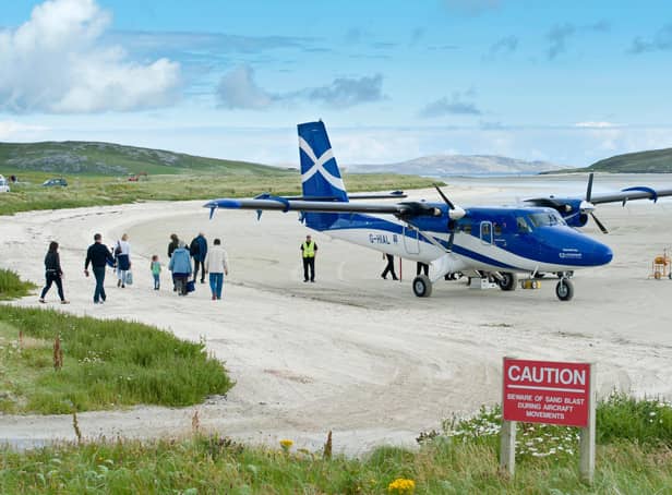 Planes flying into the island of Barra famously land on the beach (Picture: Stefan Auth/imageBROKER/Shutterstock)