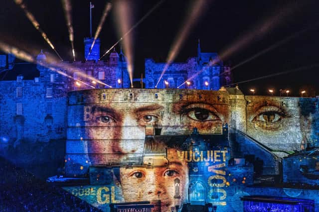 Light projections on Edinburgh Castle during the finale at this year's Royal Edinburgh Military Tattoo. Picture: Jane Barlow/PA Wire