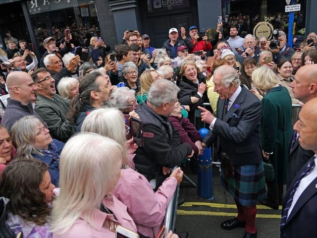 King Charles III greets members of the public as he arrives at an official council meeting at the City Chambers in Dunfermline, Fife, to formally mark the conferral of city status on the former town, ahead of a visit to Dunfermline Abbey to mark its 950th anniversary