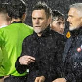 Motherwell boss Graham Alexander (left) and St Mirren counterpart Jim Goodwin after the game