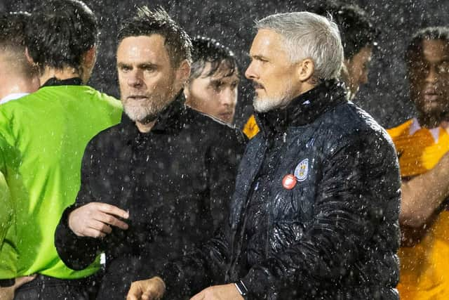 Motherwell boss Graham Alexander (left) and St Mirren counterpart Jim Goodwin after the game