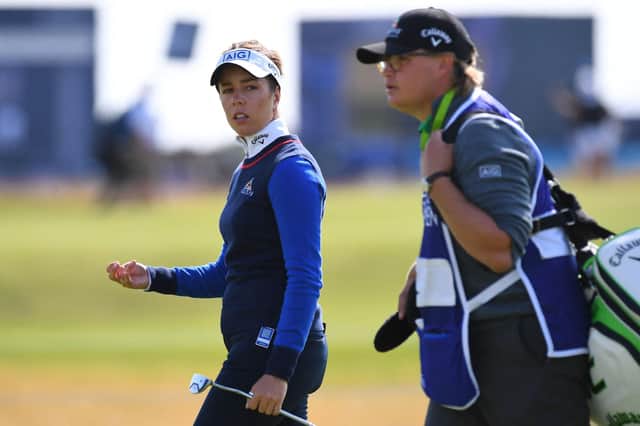 Georgia Hall talks to her caddie during the second round of the AIG Women's Open at Carnoustie. Picture: Picture: Andy Buchanan/AFP via Getty Images.