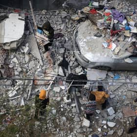 People assess the damage caused by Israeli bombardment in Rafah in the southern Gaza Strip as battles continue between Israel and the Palestinian Hamas movement. Picture: Mahmud Hams/AFP via Getty Images