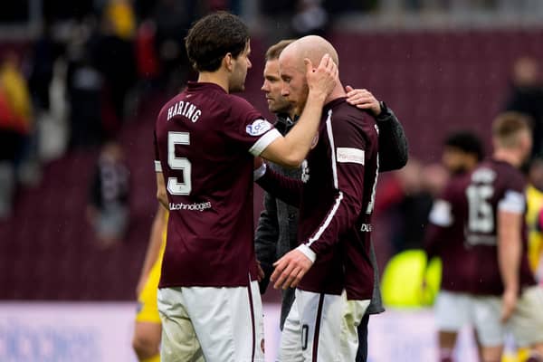 Peter Haring and Hearts manager Robbie Neilson console Liam Boyce at full time after the goalless draw with Ross County. (Photo by Sammy Turner / SNS Group)