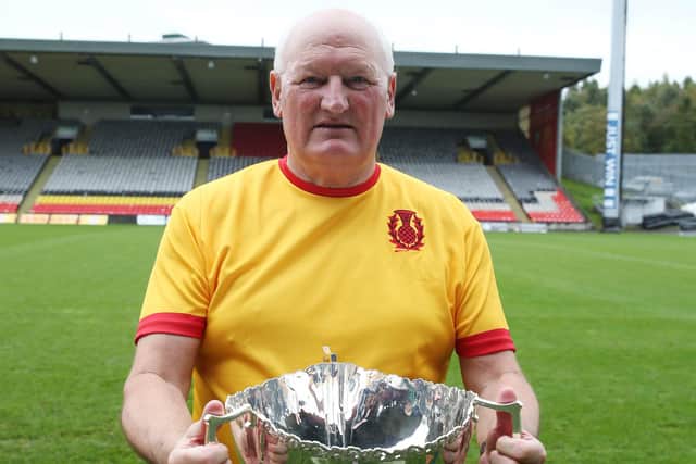 Jimmy Bone shows off the League Cup, 50 years on from the triumph.