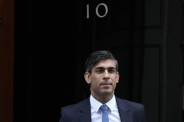 Prime Minister Rishi Sunak leaves 10 Downing Street to attend the weekly Prime Minister's Questions session in parliament in London. Picture: AP Photo/Frank Augstein