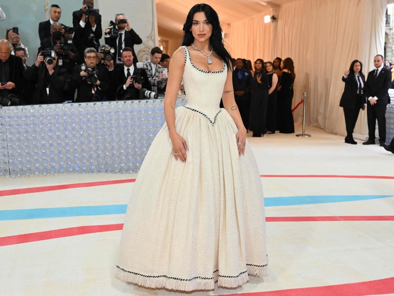 Dua Lipa, one of the event's co-chairs, at the 2023 Met Gala in a tweed Chanel wedding dress originally worn by Claudia Schiffer in 1992.