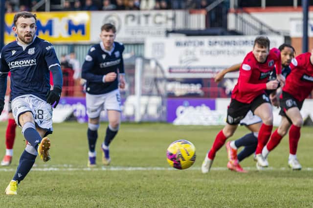 Dundee's Paul McMullan misses a penalty during the 3-0 win over Queen of the South. (Photo by Roddy Scott / SNS Group)