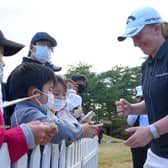 Gemma Dryburgh signs autographs for fans after completing her third round in the TOTO Japan Classic at Seta Golf Course in Shiga. Picture: Yoshimasa Nakano/Getty Images.