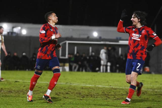 James Tavernier celebrates with Fabio Silva after scoring to make it 3-0 to Rangers and Dumbarton.