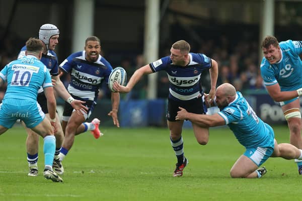 Finn Russell of Bath offloads during the Gallagher Premiership Rugby play-off semi-final against Sale Sharks at the Recreation Ground. (Photo by David Rogers/Getty Images)