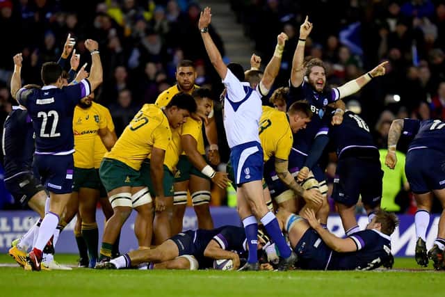 Celebrations as Stuart McInally touches down for Scotland's eighth try during the 53-24 win over Australia at Murrayfield in 2017.  (Photo by Dan Mullan/Getty Images)