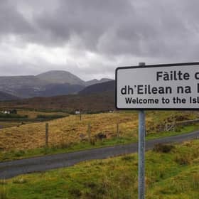 A sign in Gaelic and English on a road in the Isle of Harris.