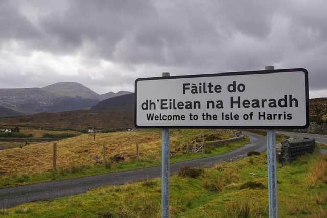 A sign in Gaelic and English on a road in the Isle of Harris.