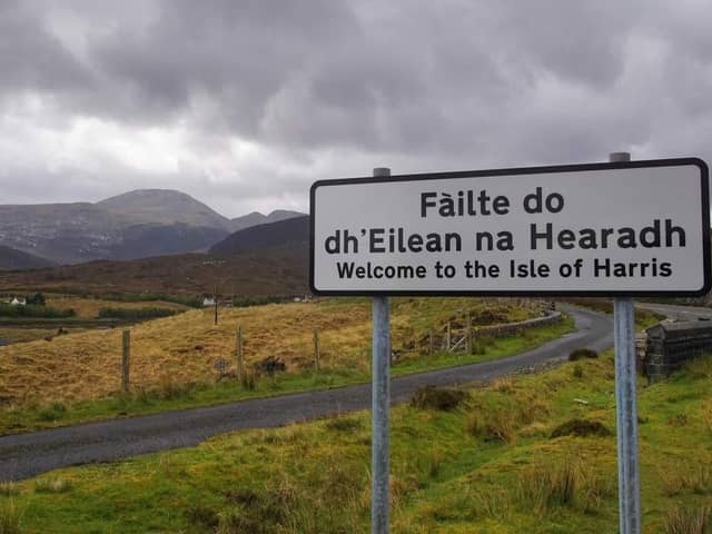 A sign in Gaelic and English on a road in the Isle of Harris.