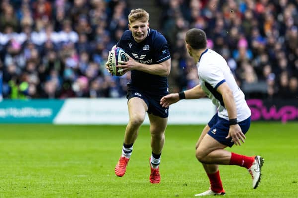 Harry Paterson, a shock inclusion for Scotland at full-back, on the charge in his debut against France.