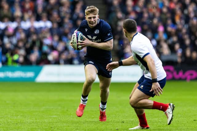 Harry Paterson, a shock inclusion for Scotland at full-back, on the charge in his debut against France.