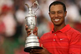 Tiger Woods poses with the Claret Jug after winning the 135th Open Golf at Royal Liverpool in 2006. Picture: John D McHugh/AFP via Getty Images.