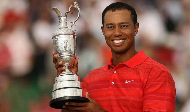 Tiger Woods poses with the Claret Jug after winning the 135th Open Golf at Royal Liverpool in 2006. Picture: John D McHugh/AFP via Getty Images.