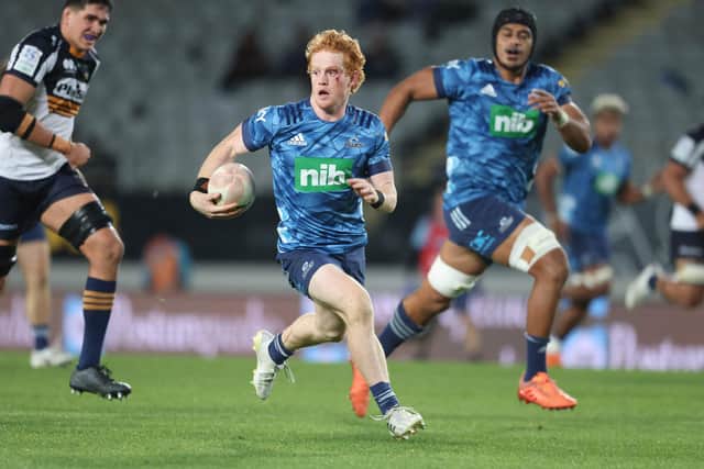 Finlay Christie in action for the Auckland Blues, scoring a try against ACT Brumbies at Eden Park in Super Rugby Trans-Tasman. Picture: AFP via Getty Images