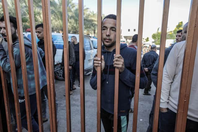 People mourn as they collect the bodies of Palestinians killed in airstrikes on Saturday as heavy fighting raged on in the northern Gaza Strip. Picture: Ahmad Hasaballah/Getty Images