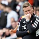 Barry Robson lamented the decision not to check a potential penalty for a challenge on Marley Watkins.