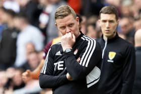 Barry Robson lamented the decision not to check a potential penalty for a challenge on Marley Watkins.