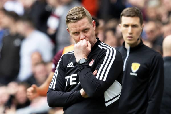 Barry Robson lamented the decision not to check a potential penalty for a challenge on Marley Watkins.
